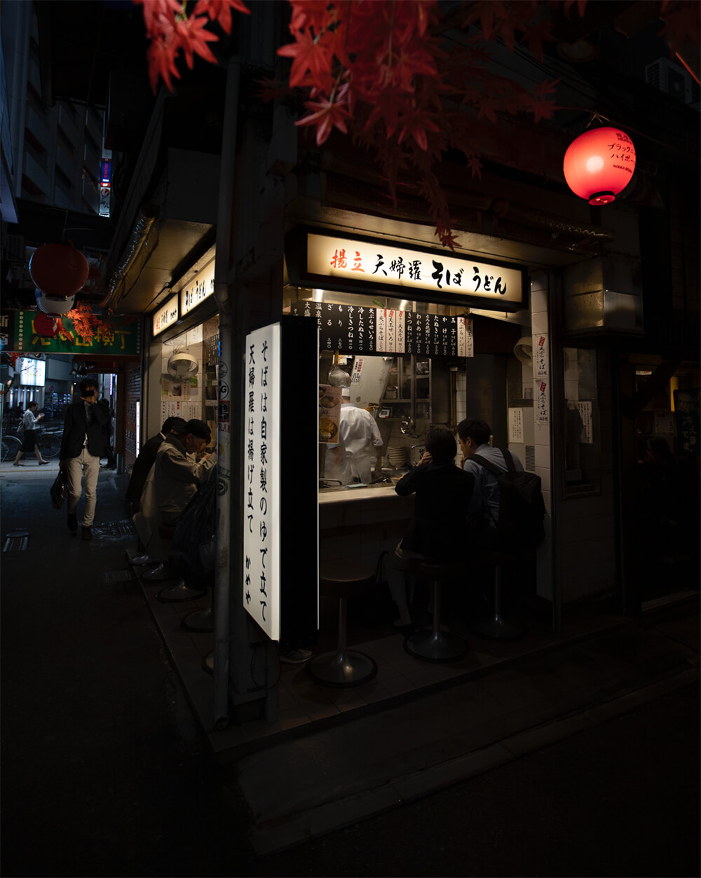 Raw low light image of night store by Julian Lallo