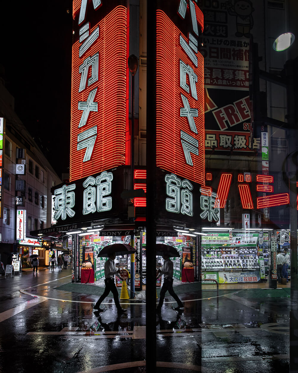 Image of neon signs at night by Julian Lallo