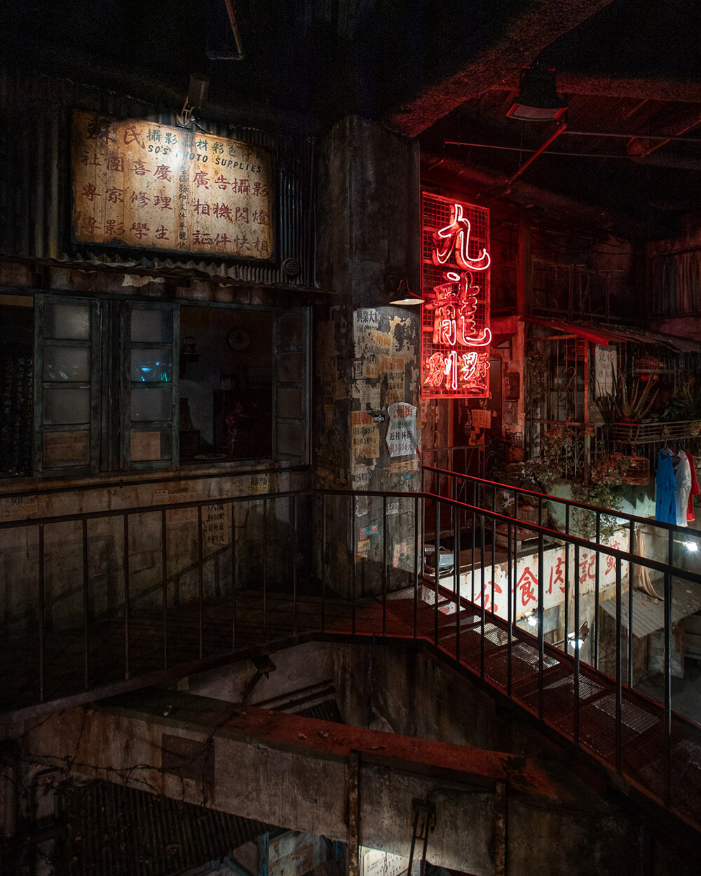 Low light image of neon signs at night by Julian Lallo