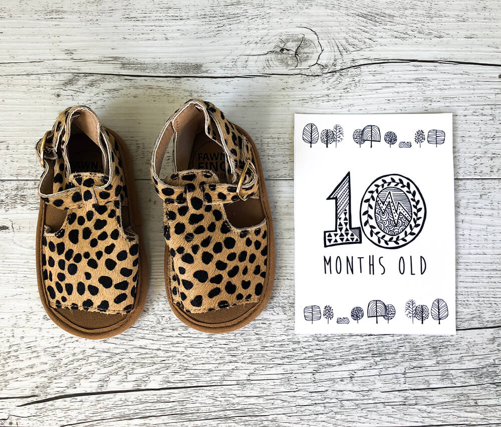 Children's shoes and printed 10 months old card