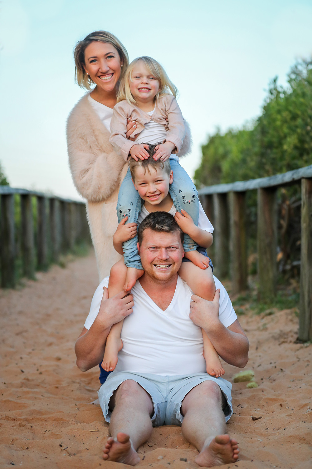 Portrait image of Jenn's family totem pole