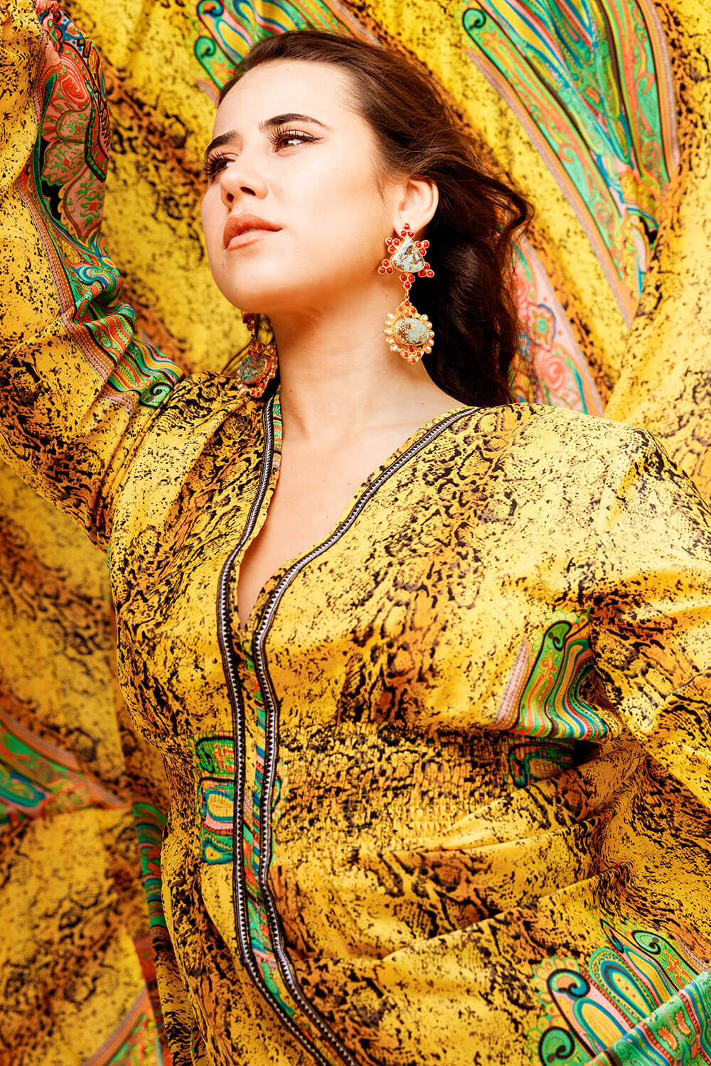 Portrait photo of model in yellow dress by Scott Stramyk