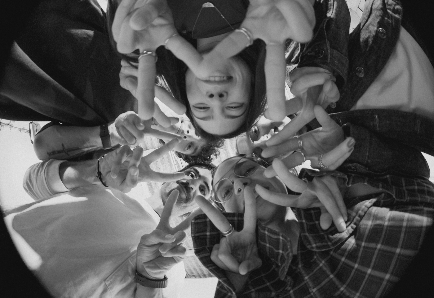 Overhead fisheye view of the Circle ambassadors gathered together in a circular composition.