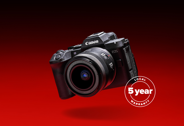 Canon mirrorless camera displayed against a red gradient background with a "5 year" anniversary badge.