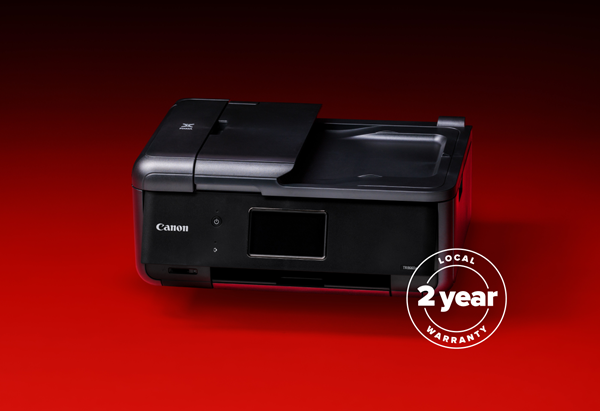 Canon all-in-one printer displayed against a red gradient background with a "2 year" anniversary badge.