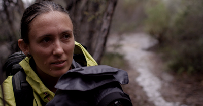 Krystle-Wright-Canon-Master-holding-Canon-DSLR-outdoors