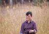 Portrait image of kid in field