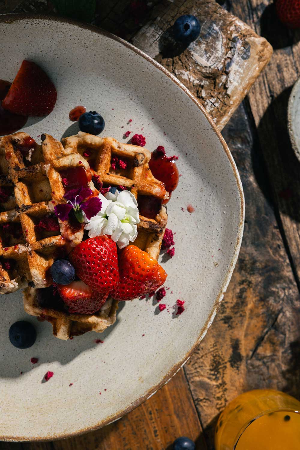 Image of waffles with fruit by Reuben Looi