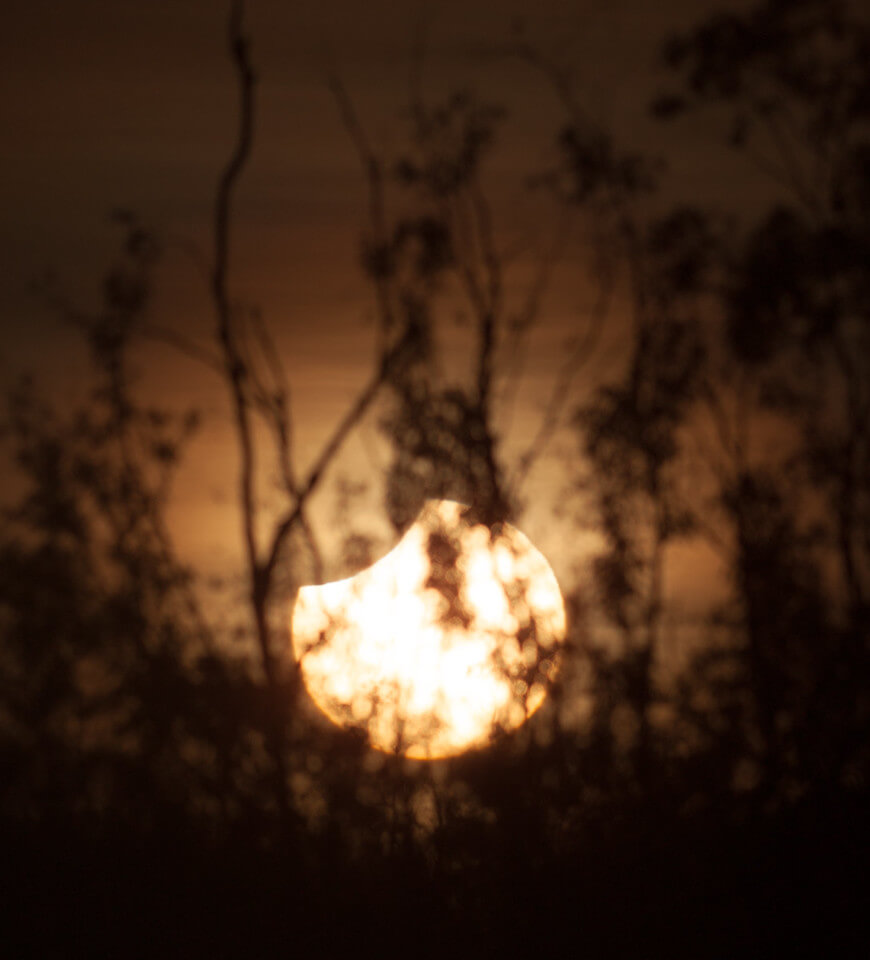 Sunrise - Solar eclipse image by Phil Hart