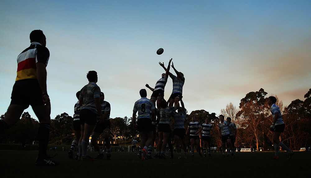 Sports photography tips - Going for the ball image by Phil Hillyard