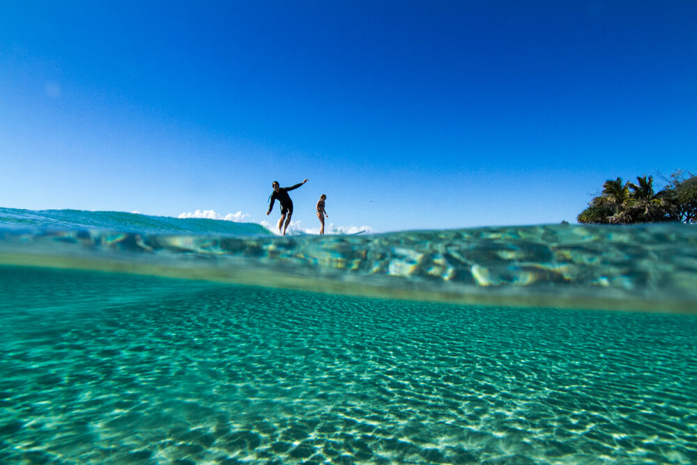 Landscape image of surfer