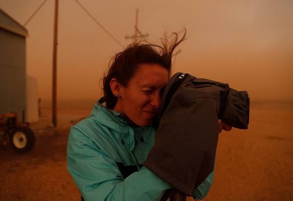 Krystle Wright with a covered camera