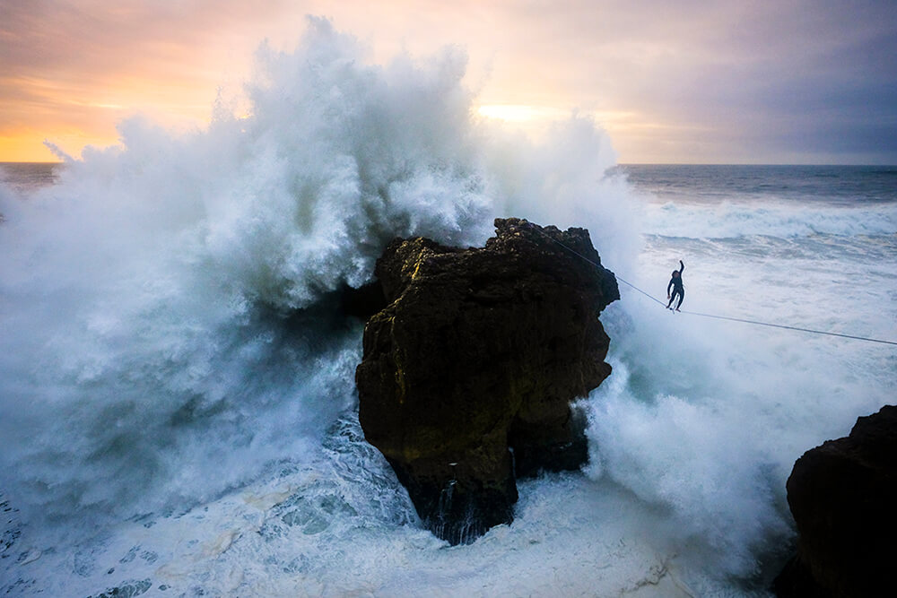 Image of slackline above the ocean