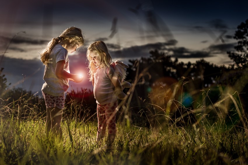 child playing with light