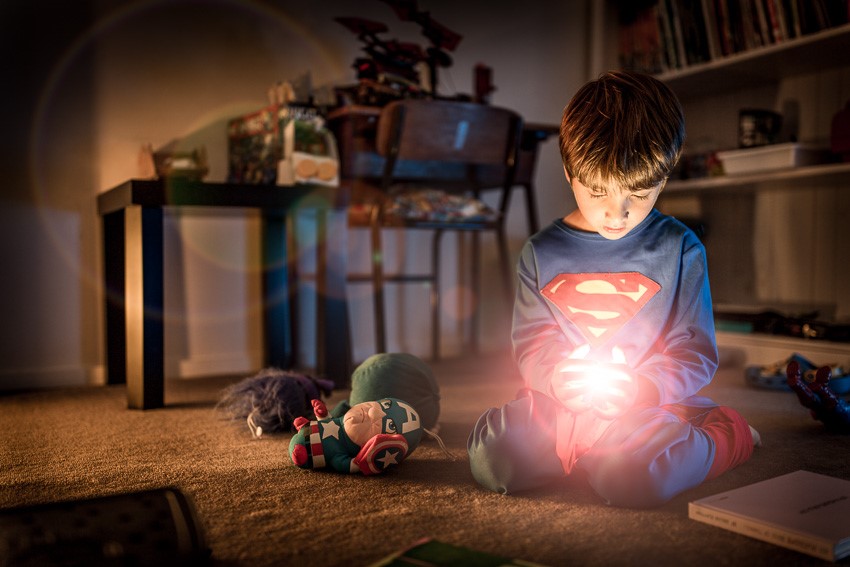 child playing with light