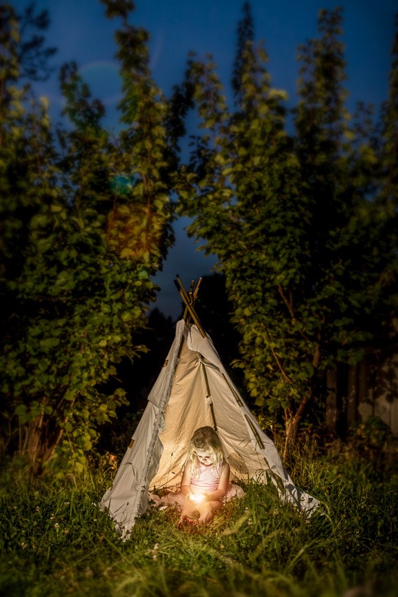 child playing with light