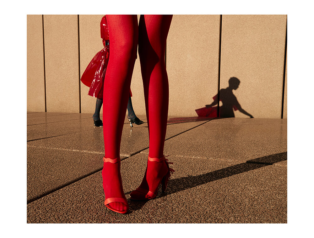 Portrait image of person in red stockings
