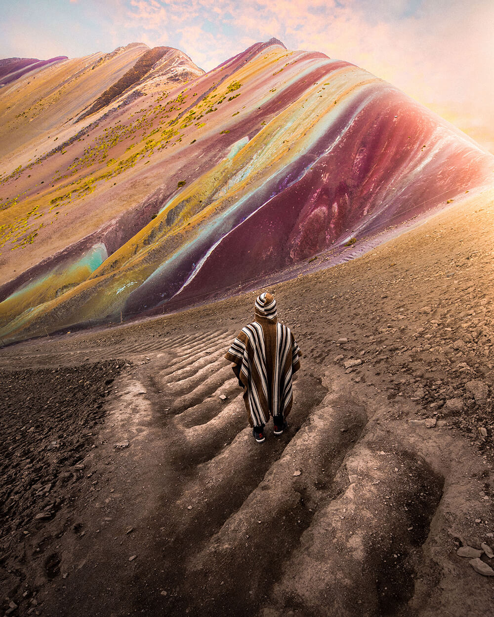Landscape image of man on mountain