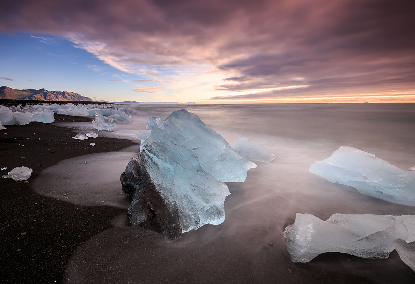 Image of icy formations on a beach by photographer Mitch Pearson-Goff