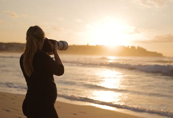 Emily Abay portrait shooting a landscape
