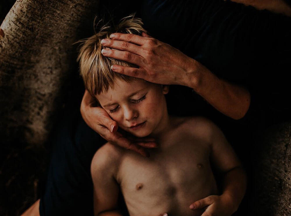 Portrait image of child in hands