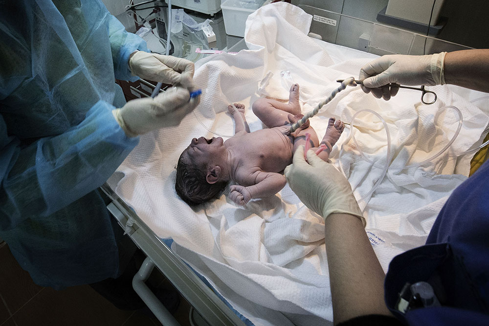 image of baby born in refugee camp