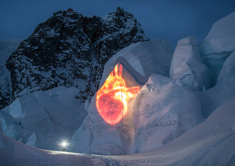 Heart image projected on glacier