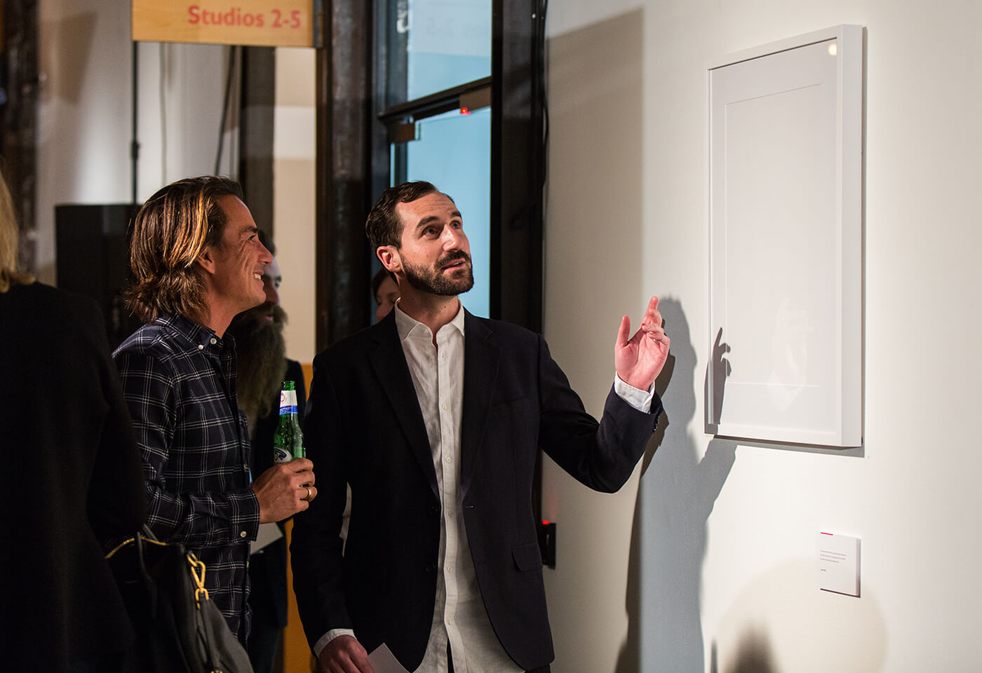 image of Canon staff and patron looking at blank frame