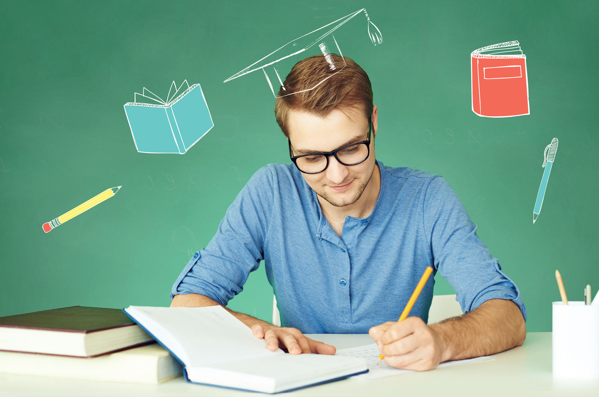 man writing in a book with a pen