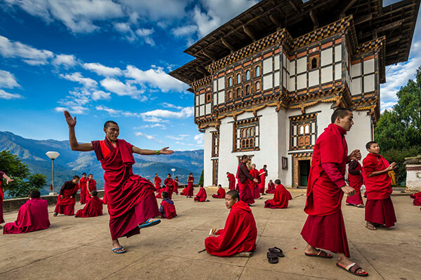 Photo of monks in a temple by Richard Ianson