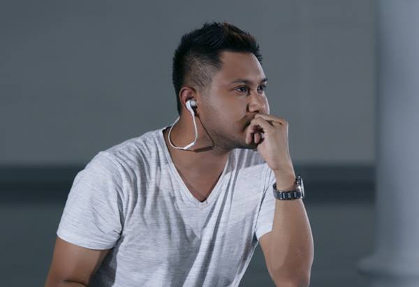 Image of model using earphones