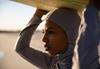 photo of a Muslim surfer. Image by Attila Csaszar