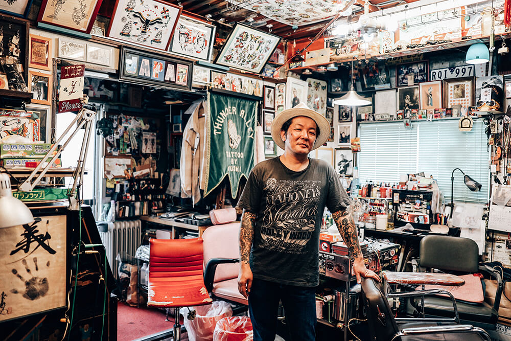 Portrait of a tattoo artist taken with the EOS R. Shot by Maria Boyadgis