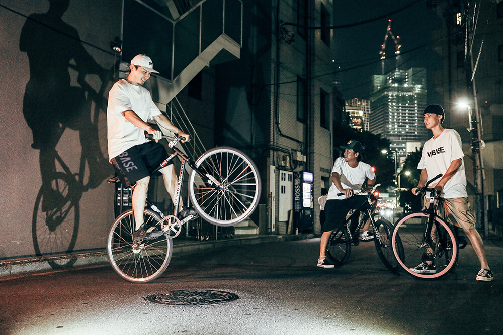 Photo of cyclists in the streets of Tokyo taken with the EOS R. Shot by Maria Boyadgis