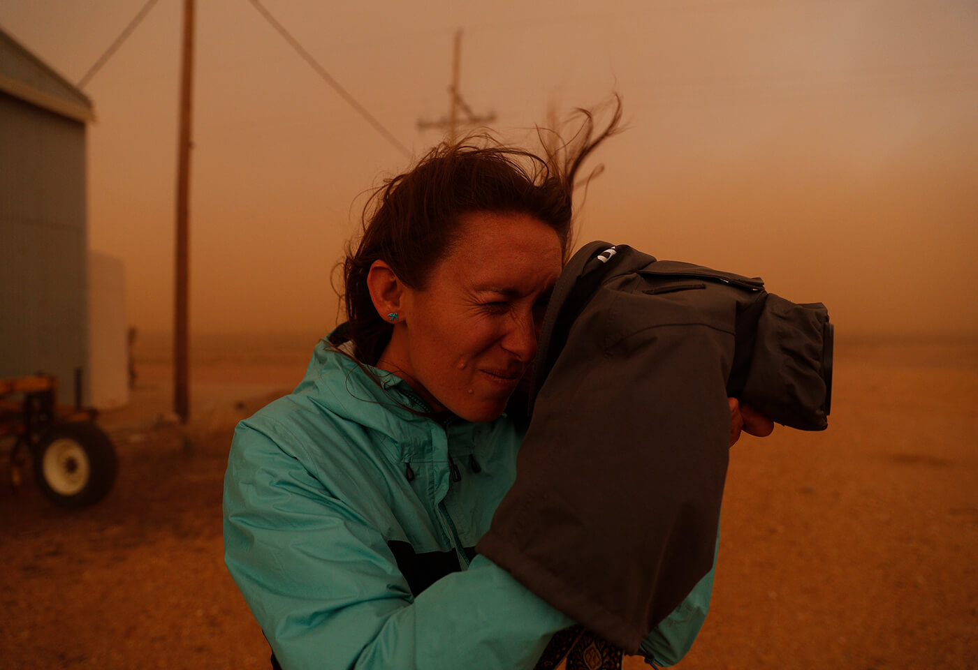 Krystle Wright with a covered camera