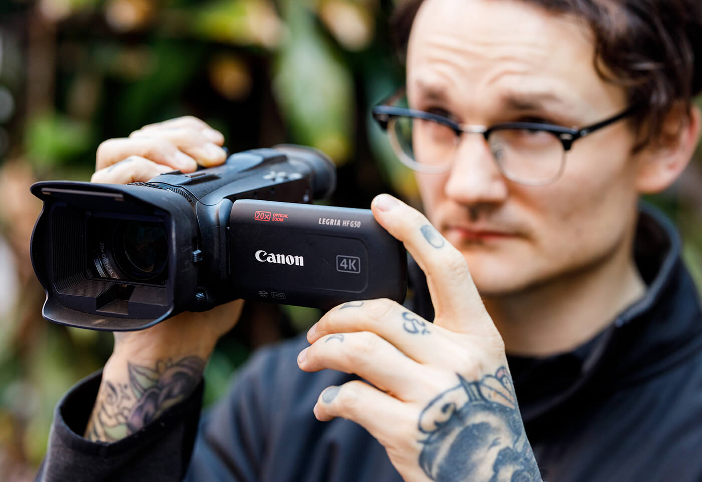 Neal Walters with a Canon camcorder