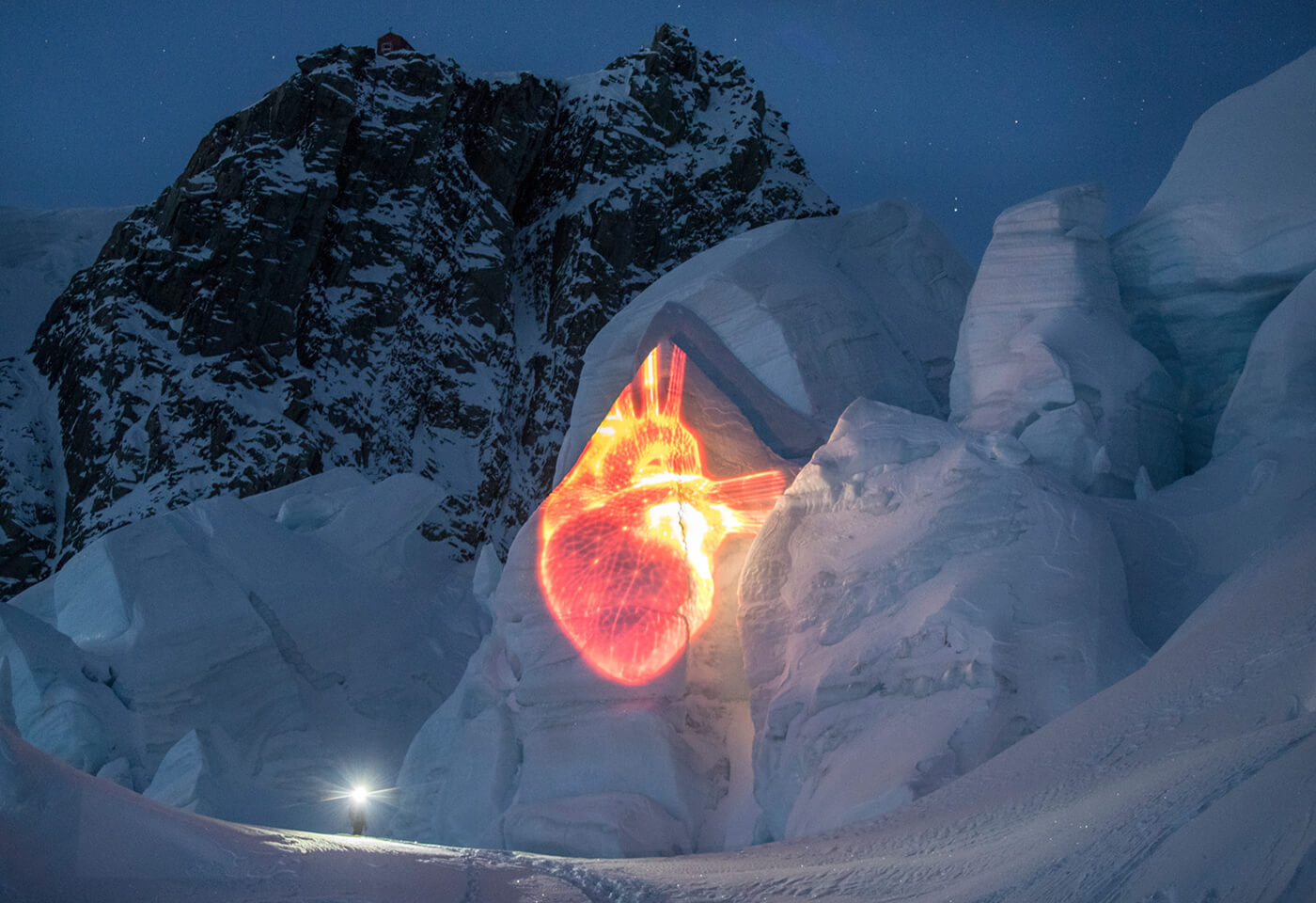 Heart image projected on glacier