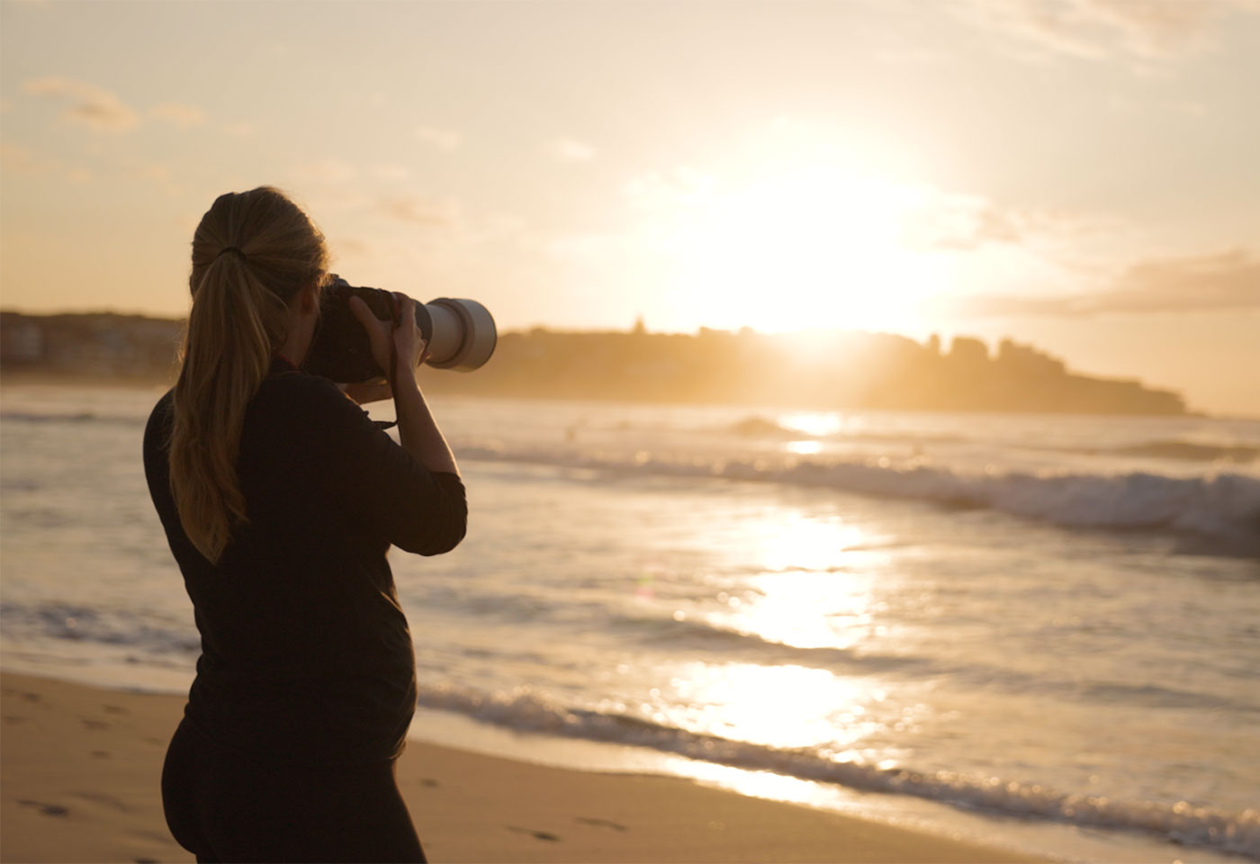 Emily Abay portrait shooting a landscape