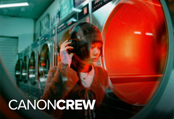 Image of a woman in the laundromat taken by Canon Crew member Joshua Nai